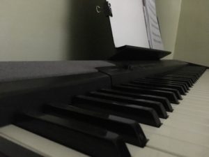 Piano keys and a music book